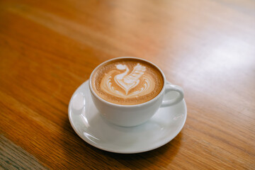 Latte art coffee in a white mug