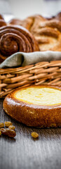 Fresh baked bread, various delicious freshly baked bread on white background, copy space. Variety of artisan bread composition, top view