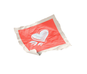 Crinkled, red square paper with a white heart design
