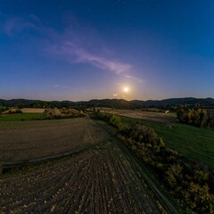 Obraz premium Nighttime rural landscape, moonlit fields