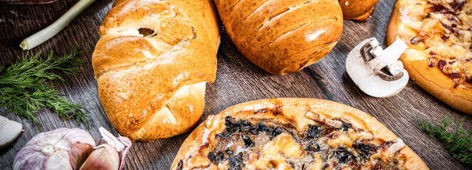 Pie and homemade bread, pizza or pie ingridients, food flat lay on kitchen table background. Working with butter, milk, yeast, flour, eggs, sugar pastry or bakery cooking. Text space