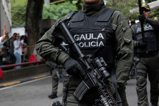 GAULA military police Colombia carrying rifle, Armed GAULA unit with weapon, Colombian special operations police with firearm. High quality photo