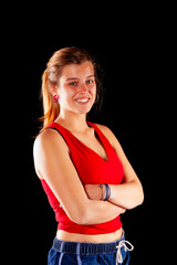 Young and beautiful woman at studio with black backgound