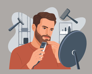 Grooming Routine A Bearded Man Trimming His Beard with an Electric Trimmer