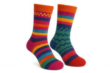 Two vibrant knitted socks with unique patterns stand out against a transparent background, ready to add warmth and style