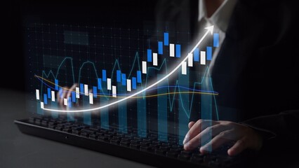 A professional engaged in financial data analysis using advanced chart visualization on a keyboard in a modern business setting, illustrating market growth. Copula