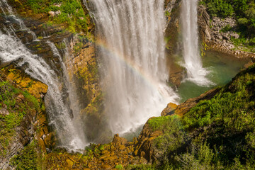 14 July 2025 Tortum Erzurum. Tortum waterfall, tortum dam, lake and fish farms on the lake on a sunny day.