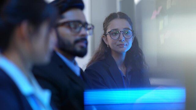 An AI development team conducts a sprint planning session for a new machine learning model. They use a kanban board to map out the data science workflow and review the algorithm's code.