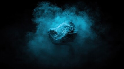 A large, dark-colored rock is suspended in a swirling, ethereal blue smoke against a black background.