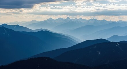Fototapeta premium Majestic Mountain Ranges Fade into the Hazy Horizon
