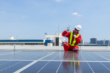 Engineers analyzing rooftop solar panel system data