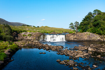 Scenic Aerial Shot of the Aasleagh Falls Waterfall in Connemara with Summer Sunshine