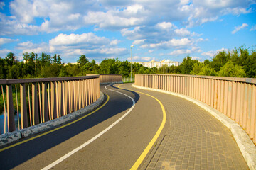 A road with a yellow line down the middle.  Russia. Moscow. 07.09.25