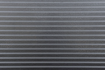 Obraz premium Textured grey horizontal lines for modern backgrounds and architectural designs. Metal texture background with stripes. Copy space 