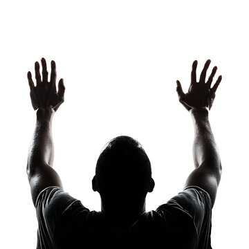 Person facing away with arms raised against white background conveying surrender achievement or religious experience