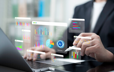 Businessman using AI analytics dashboard with holographic graphs and charts on laptop representing financial report business intelligence strategy and modern technology for corporate growth