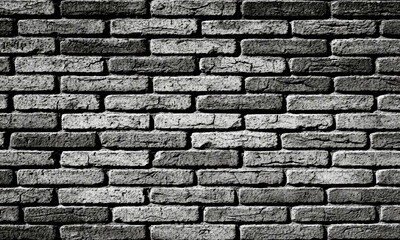 Abstract seamless pattern of white brick wall silhouette texture on a plain white background in vector style illustration.