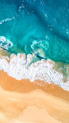 Fototapeta premium Aerial View of Turquoise Ocean Waves Crashing on Sandy Beach.