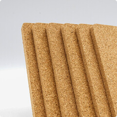 Set of rectangular cork boards arranged vertically, showing natural texture and smooth edges for crafts, insulation, or pinboards.