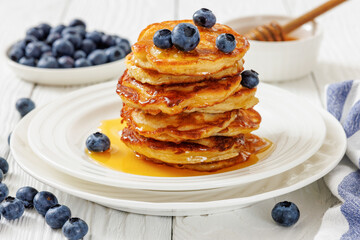 fried hot and crispy pancakes with blueberries