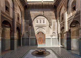 Courtyard of Al-Attarine Madrasa, one of the most beautiful historical madrasas in Fez medina, Morocco