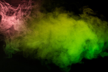 Yellow and green steam on a black background.
