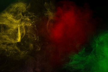 Yellow and pink steam on a black background.