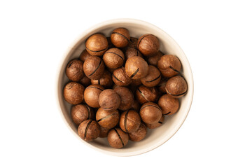 Macadamia nuts in a shell isolated on a white background.