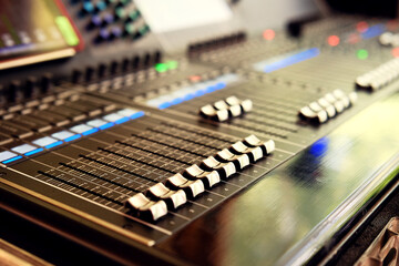 Professional audio equalizer DJ remote control in studio. Sound and music recording industry. Modern sound equipment.