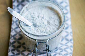 Chia pudding in a jar with a spoon