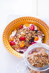 Granola bowl served with berries and yoghurt