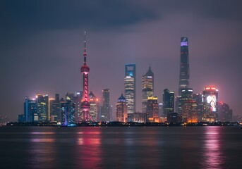 Obraz premium Shanghai Night Skyline Illuminated Cityscape Reflection on Water, Modern Architecture, Skyscrapers, Urban Landscape, China.