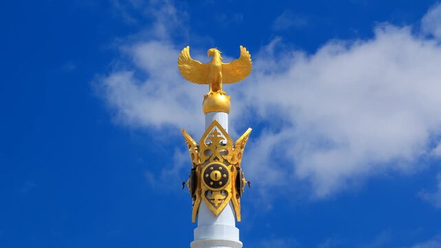 Kazakh Eli independence monument with beautiful clouds in Astana