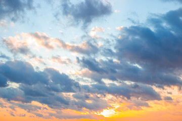Fototapeta premium Sky full of colorful clouds at sunset. Skyscape