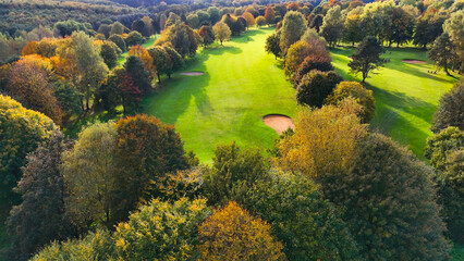 Drone view of autumn golf course in Germany.