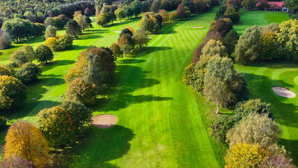 Drone view of autumn golf course in Germany.