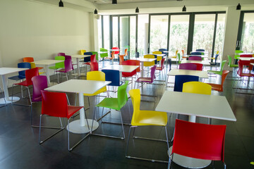 Empty Cafeteria with Colorful Chairs