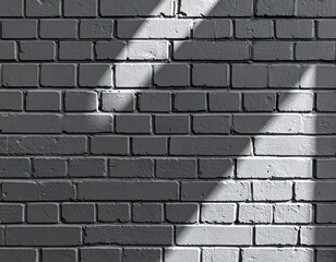 Gray brick wall with diagonal sunlight shadows