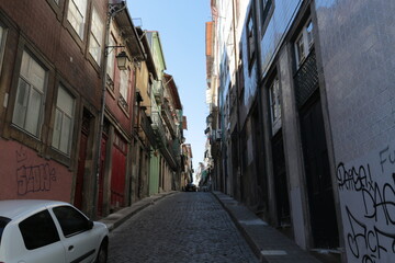 Fototapeta premium Historic Old Town Street with Traditional Architecture in Porto