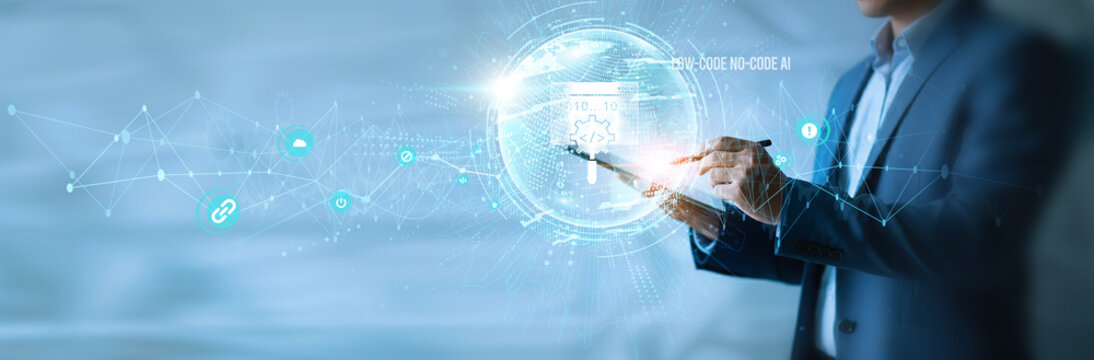 Businessman using tab low-code no-code AI icon with global network. Automation tools, drag-and-drop development, AI integration, business workflow optimization, rapid application deployment