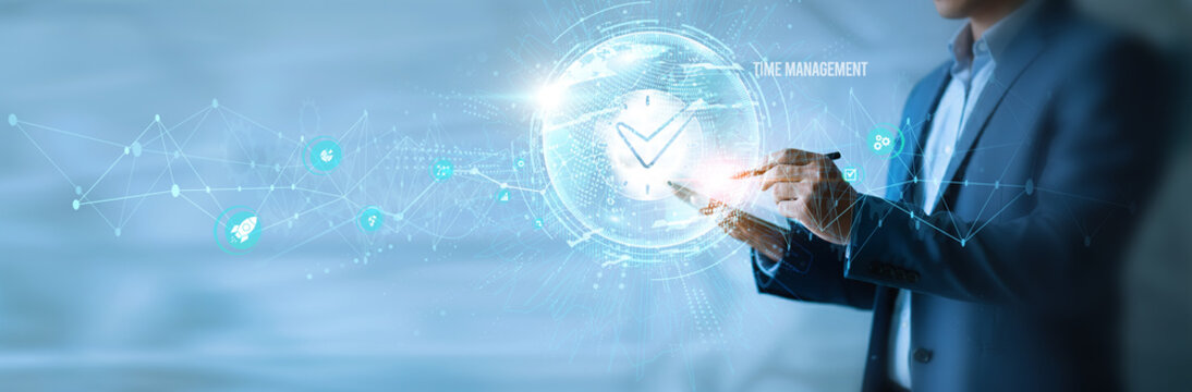 Businessman using tab time management icon with global network. Scheduling, productivity, planning tools, workflow optimization, task tracking