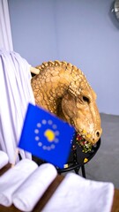 Naklejka premium Dragon head, flag, white drapes