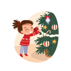 Girl decorating a Christmas tree at home, hang ornaments, wrap glitter tinsel around the tree, Christmas activities on holidays at home, Close-up 