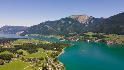 Wolfgangsee in Salzkammergut on a sunny summer day, aerial drone view. Wolfgangsee im Salzkammergut...