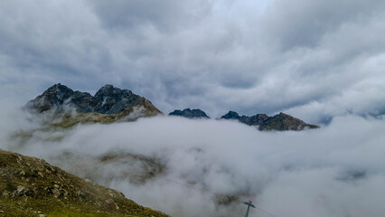 Kaunertaler Gletscherstrasse, scenic road through forest, lakes and clouds | Kaunertaler Gletscherstra&szlig;e, malerische Stra&szlig;e durch Wald, Seen und Wolken