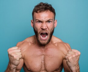 A muscular man with a strong, angry expression, fists clenched, against a plain backdrop.