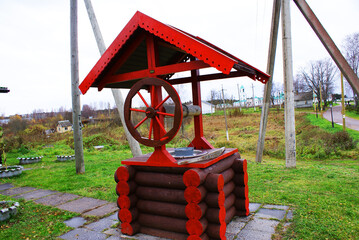 Wooden well, wood texture, log house, background, wooden planks, design.