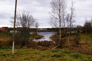 River with a turn and a pitchfork on a fortress, wildlife, background.