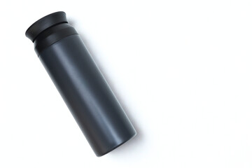 Black thermos bottle on white background