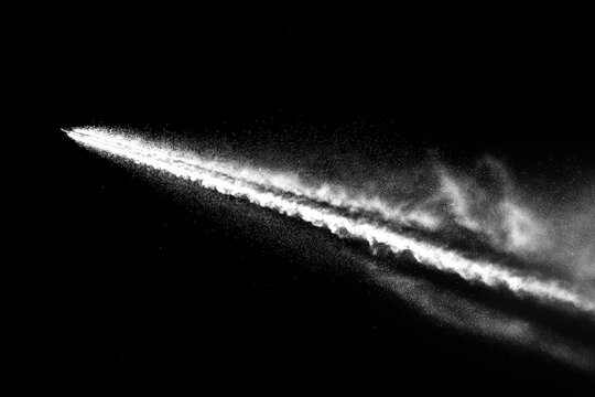 Abstract black and white dust explosion